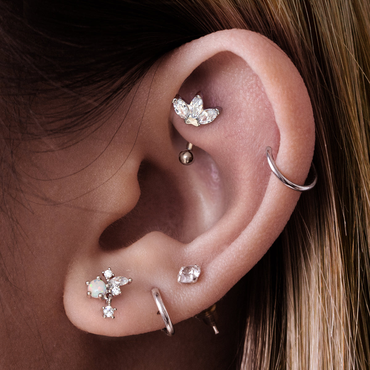Fantail Olive Gemstones Rook Curved Barbell Piercing On Model - Silver