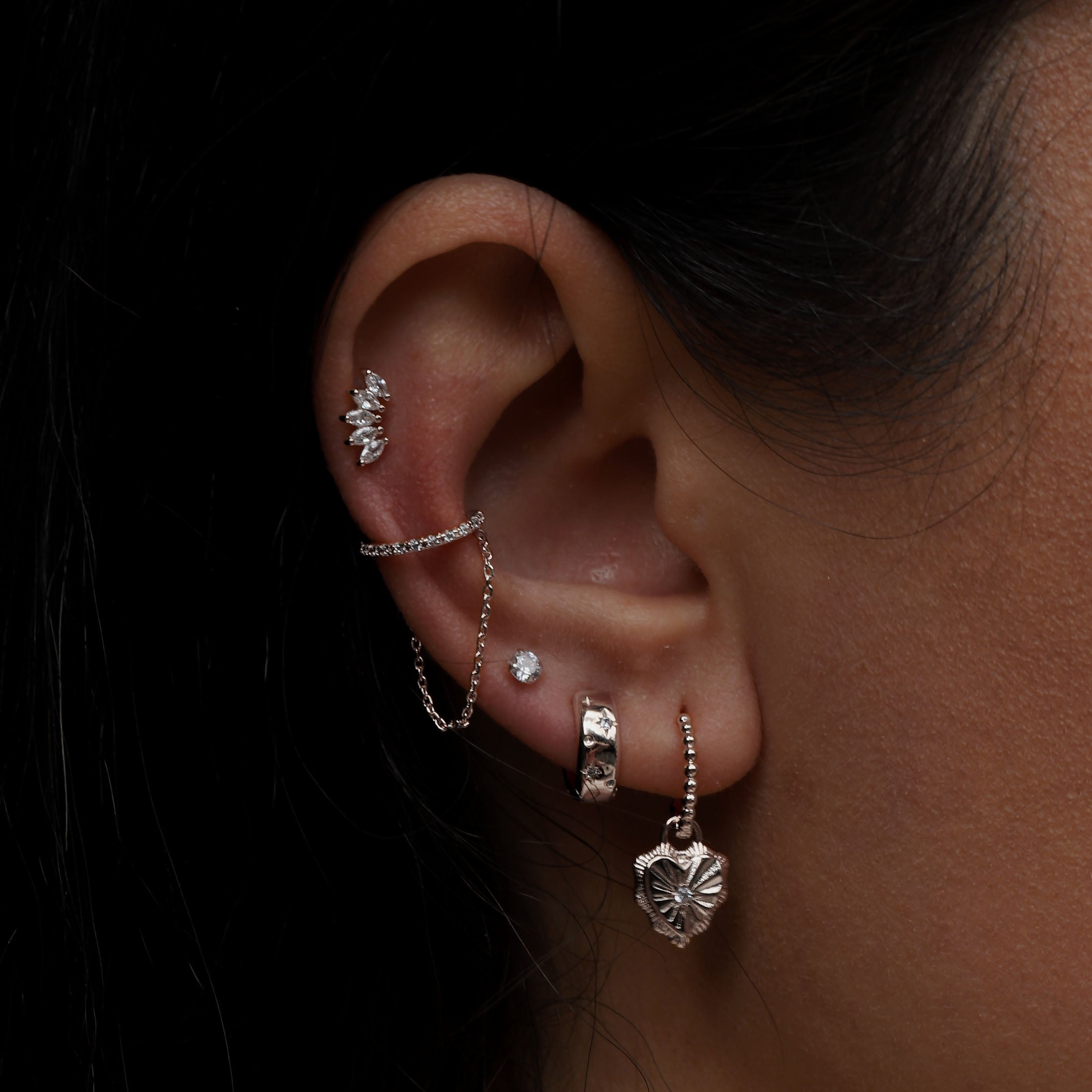 Astral Star Huggie Hoop Earrings On Model - Sterling Silver
