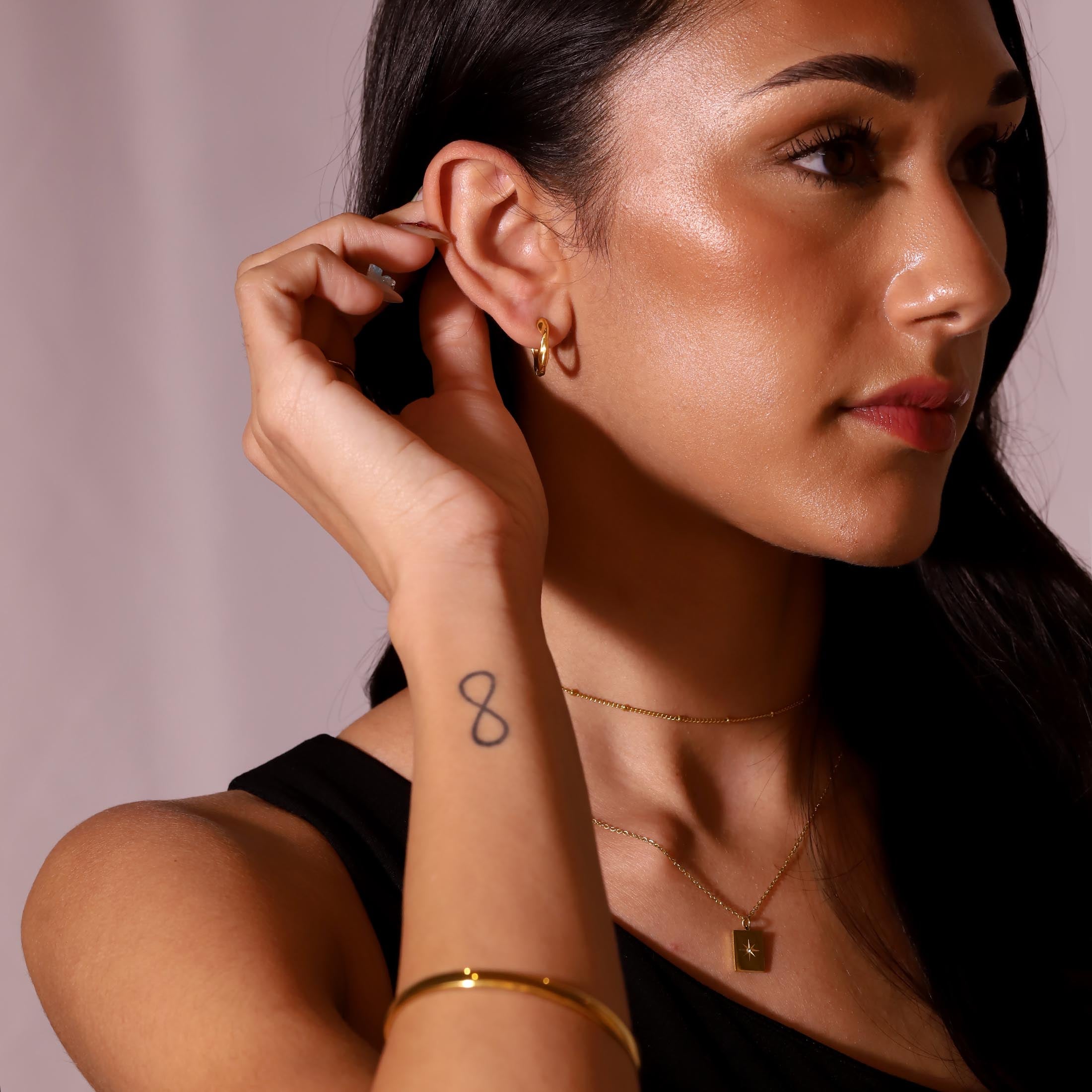 Ripple Hoop Earrings On Model 3 - Gold