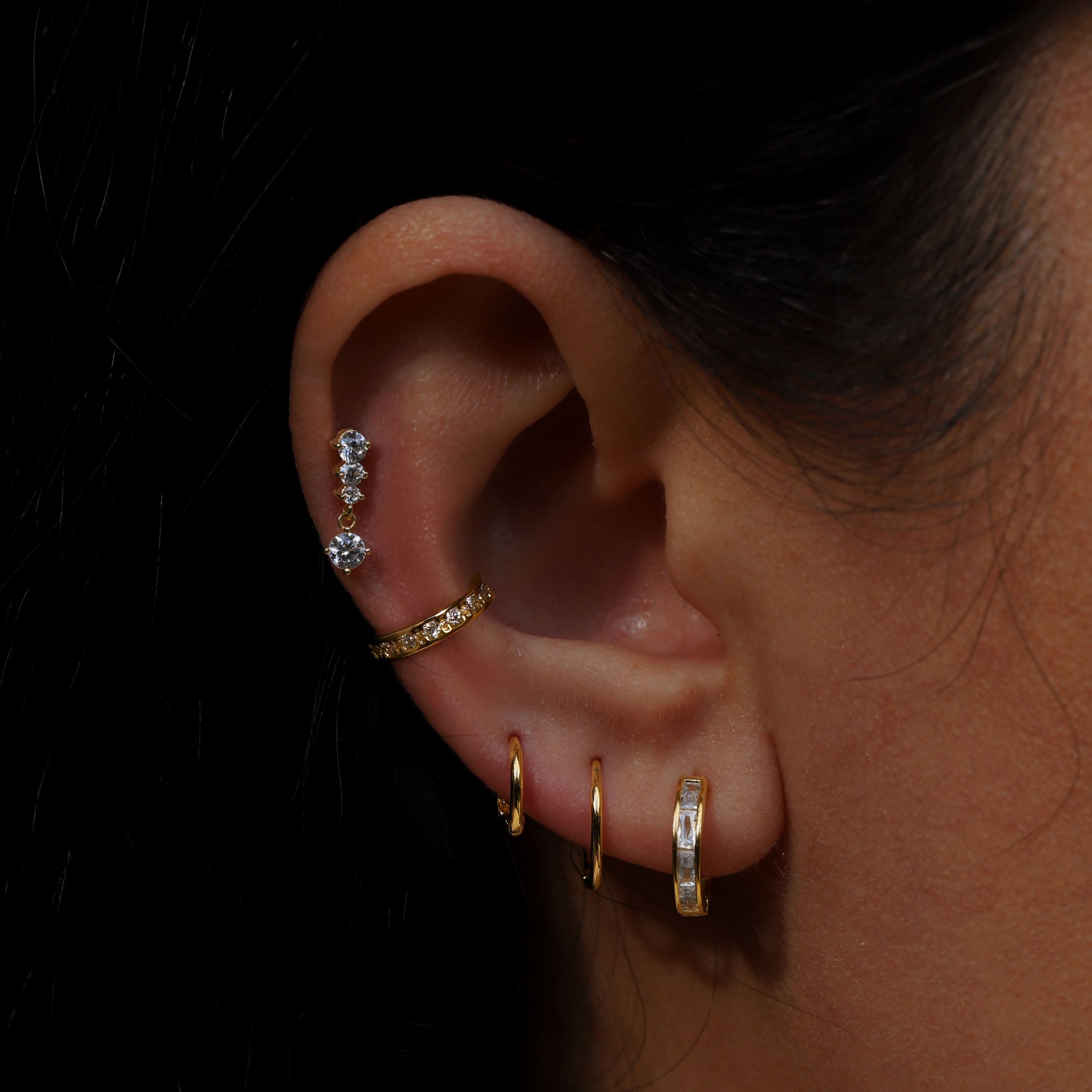 Segment Huggie Medium Hoop Earrings On Model 2 - Gold