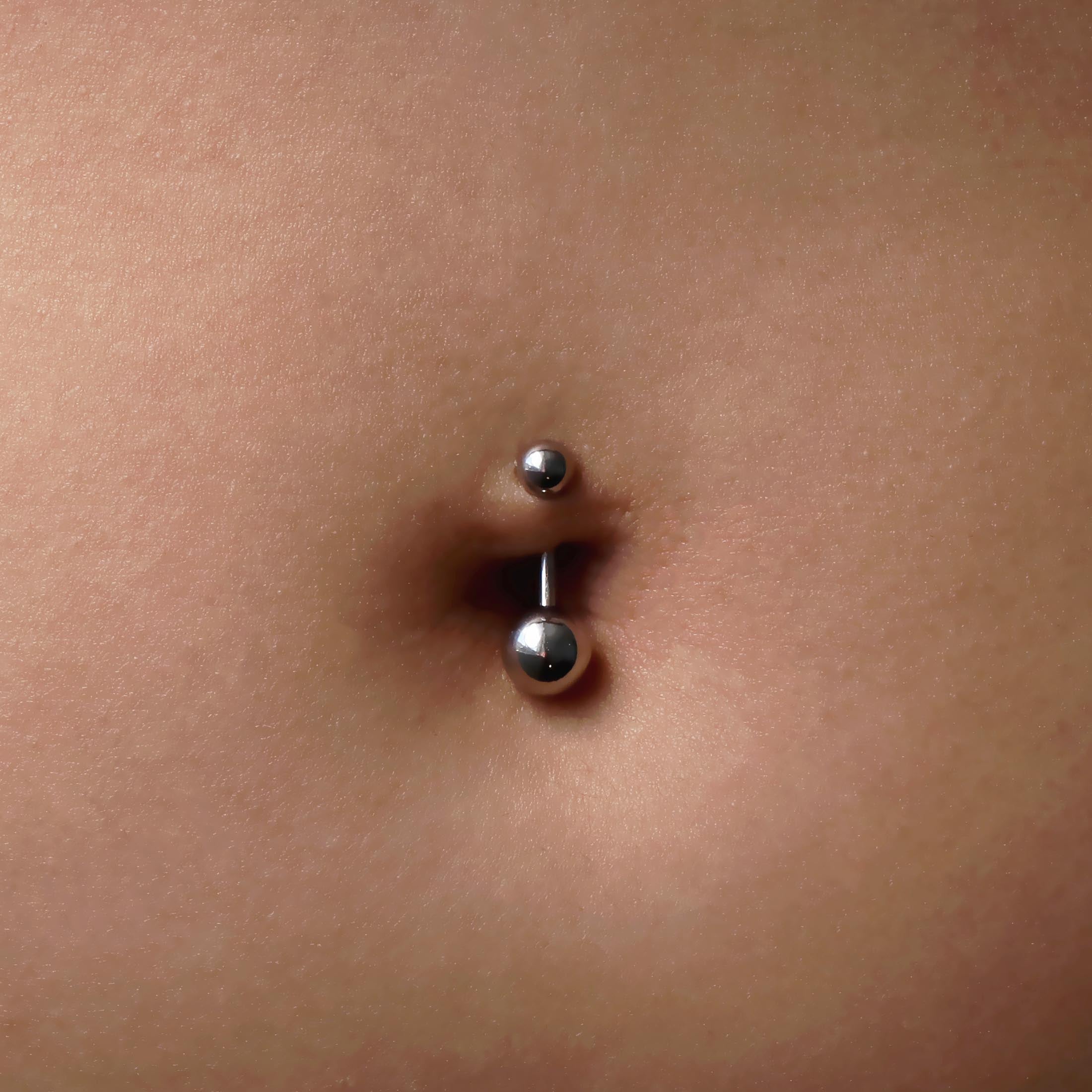 Solid Ball Belly Bar Piercing On Model - Silver