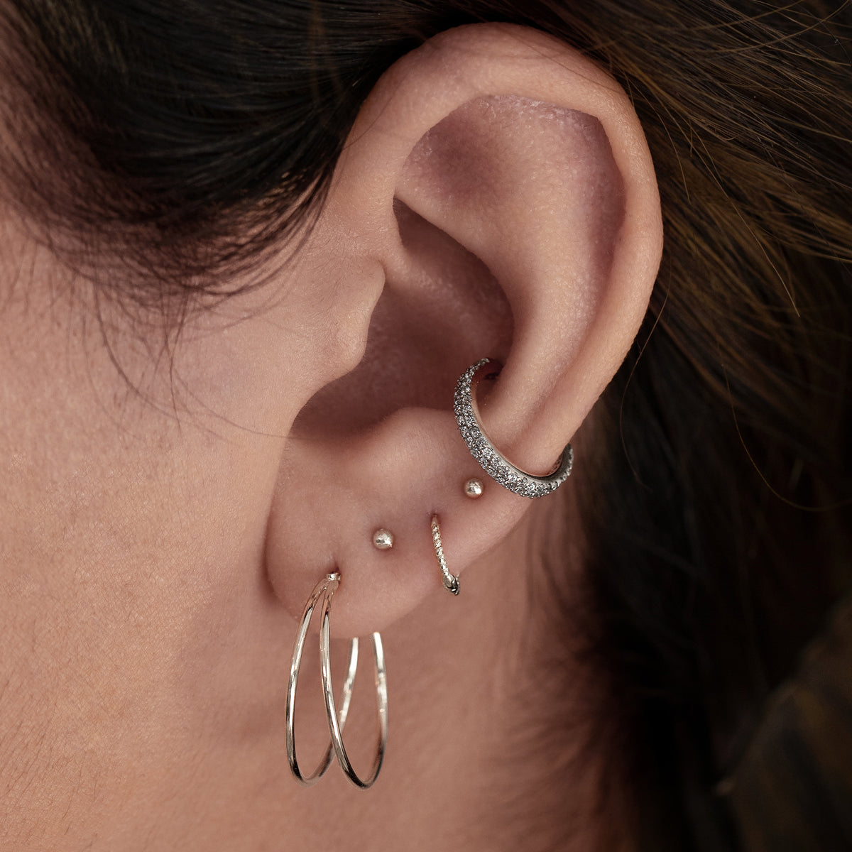 Glow Gemstone Helix Conch & Cartilage Hoop Piercing On Model - Silver