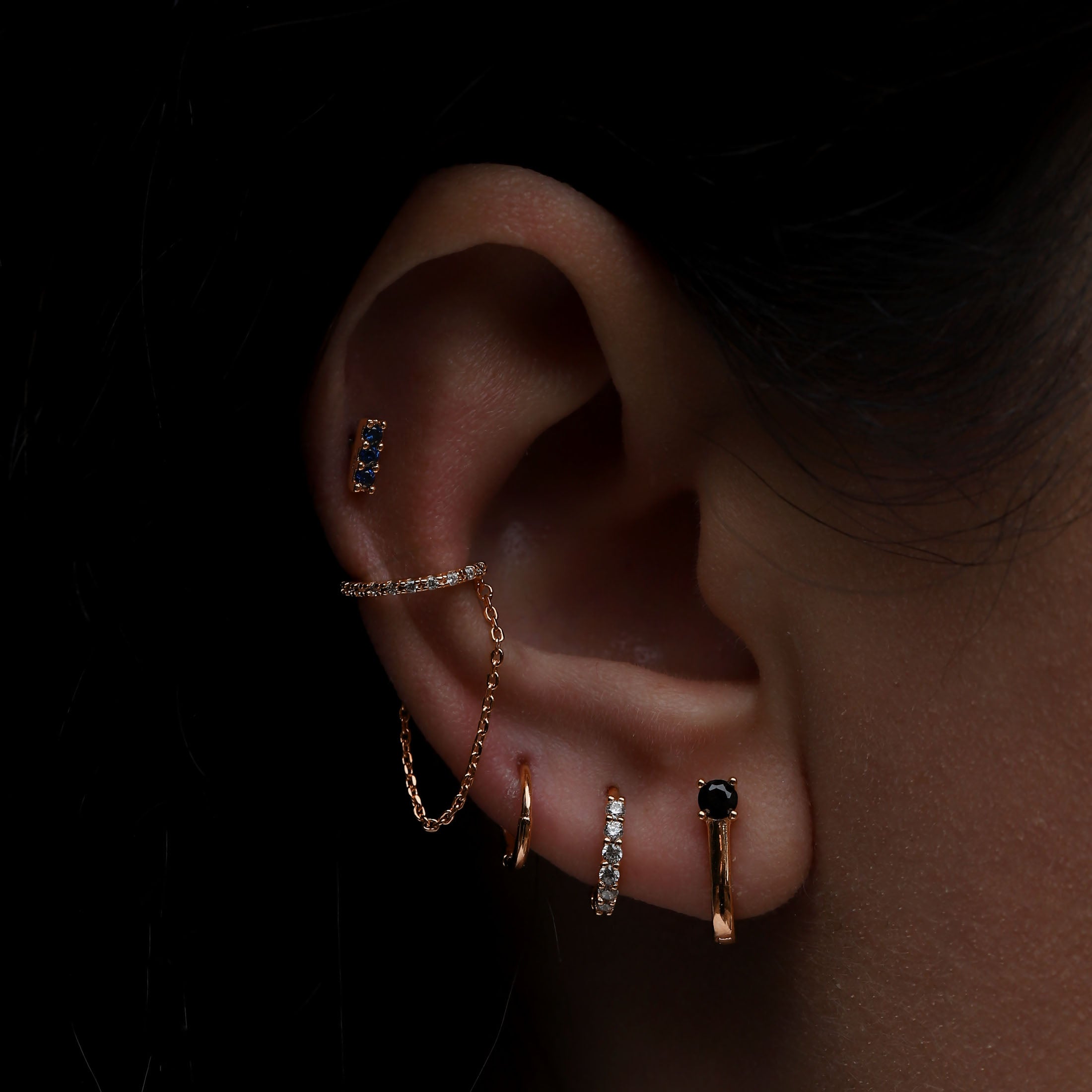 Ascension Sapphire Helix Tragus Cartilage & Conch Ear Piercing On Model - Rose Gold