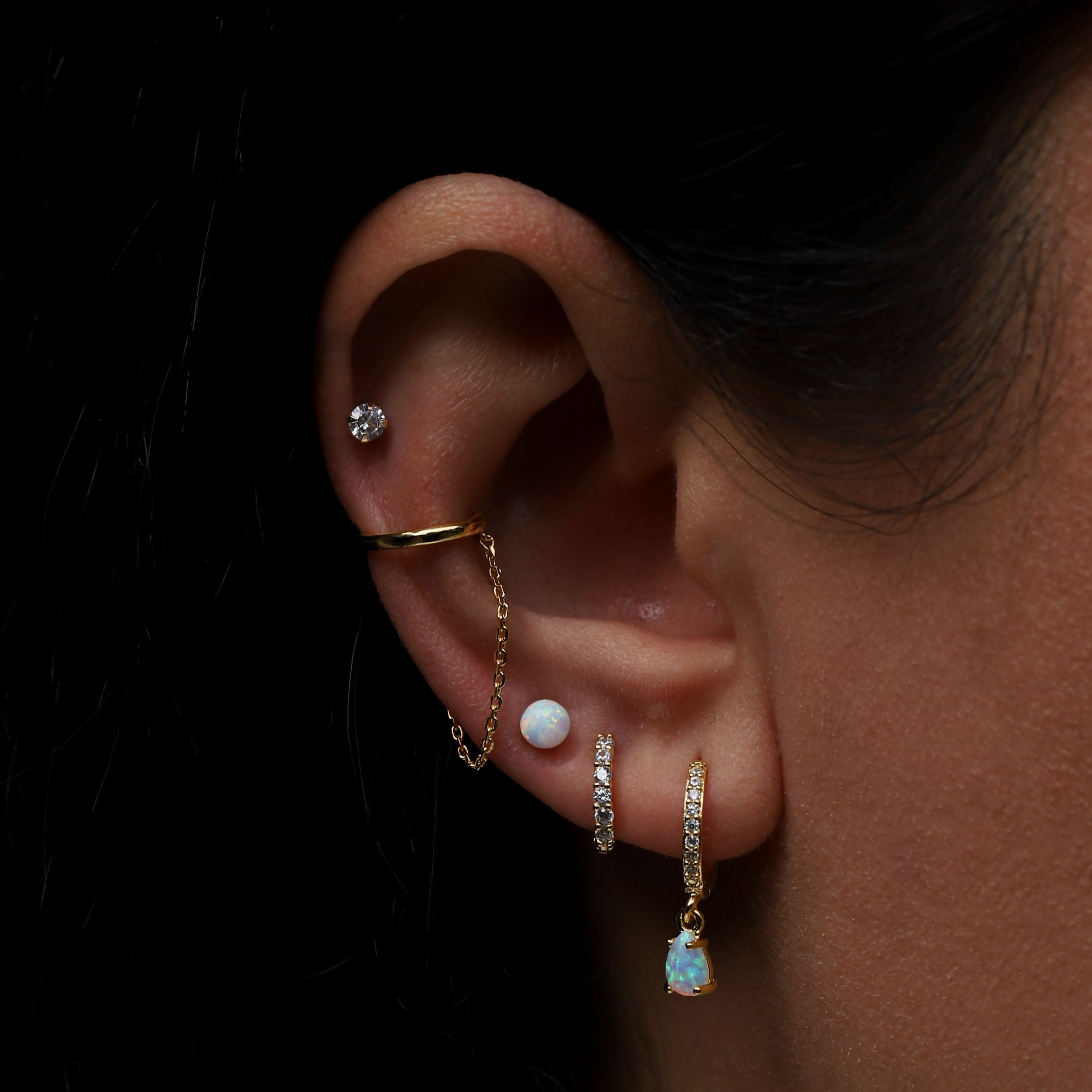 Aurora Tragus Helix Cartilage & Conch Ear Piercing On Model - 14K Solid Gold