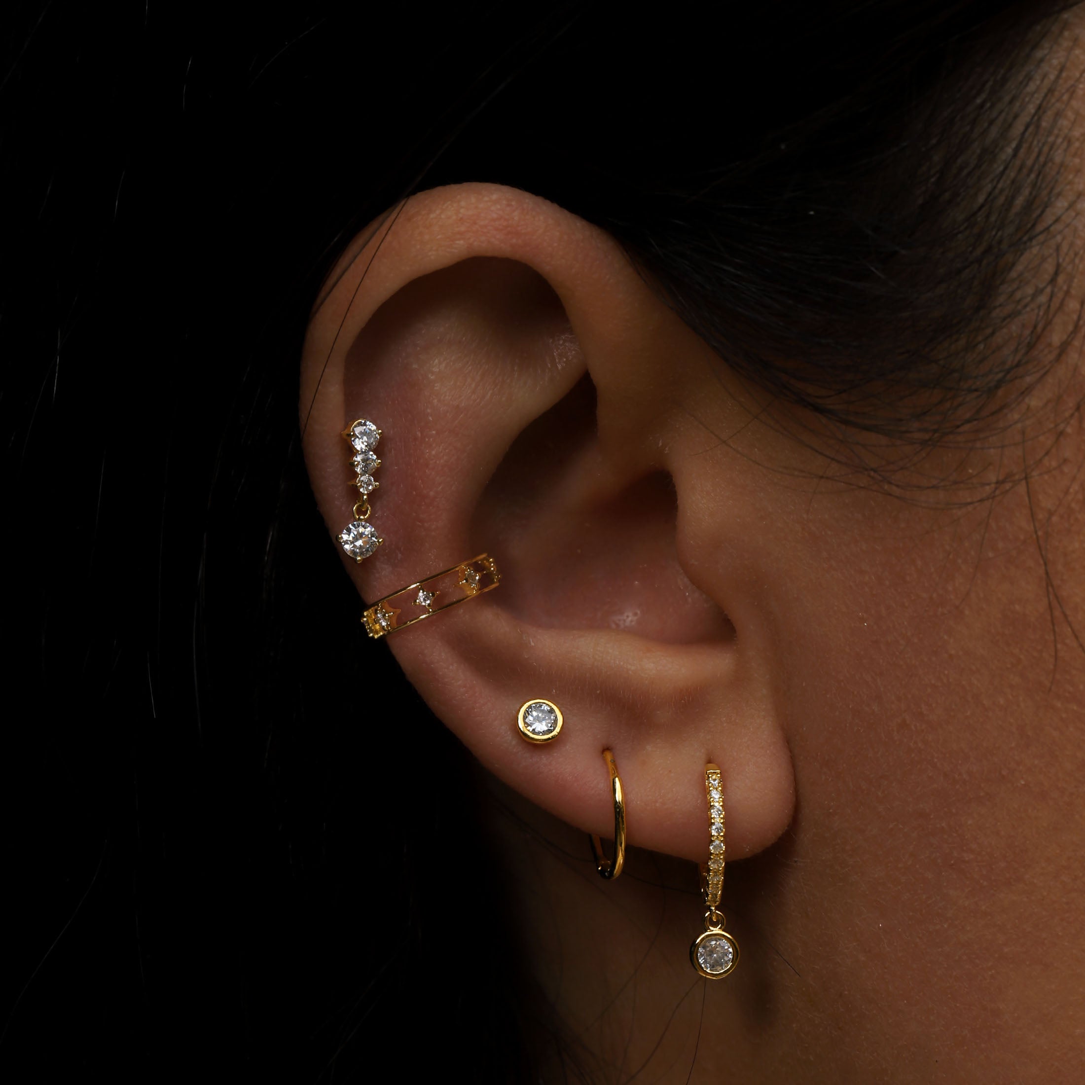 April Birthstone Tragus Helix Cartilage & Conch Ear Piercing On Model - Gold