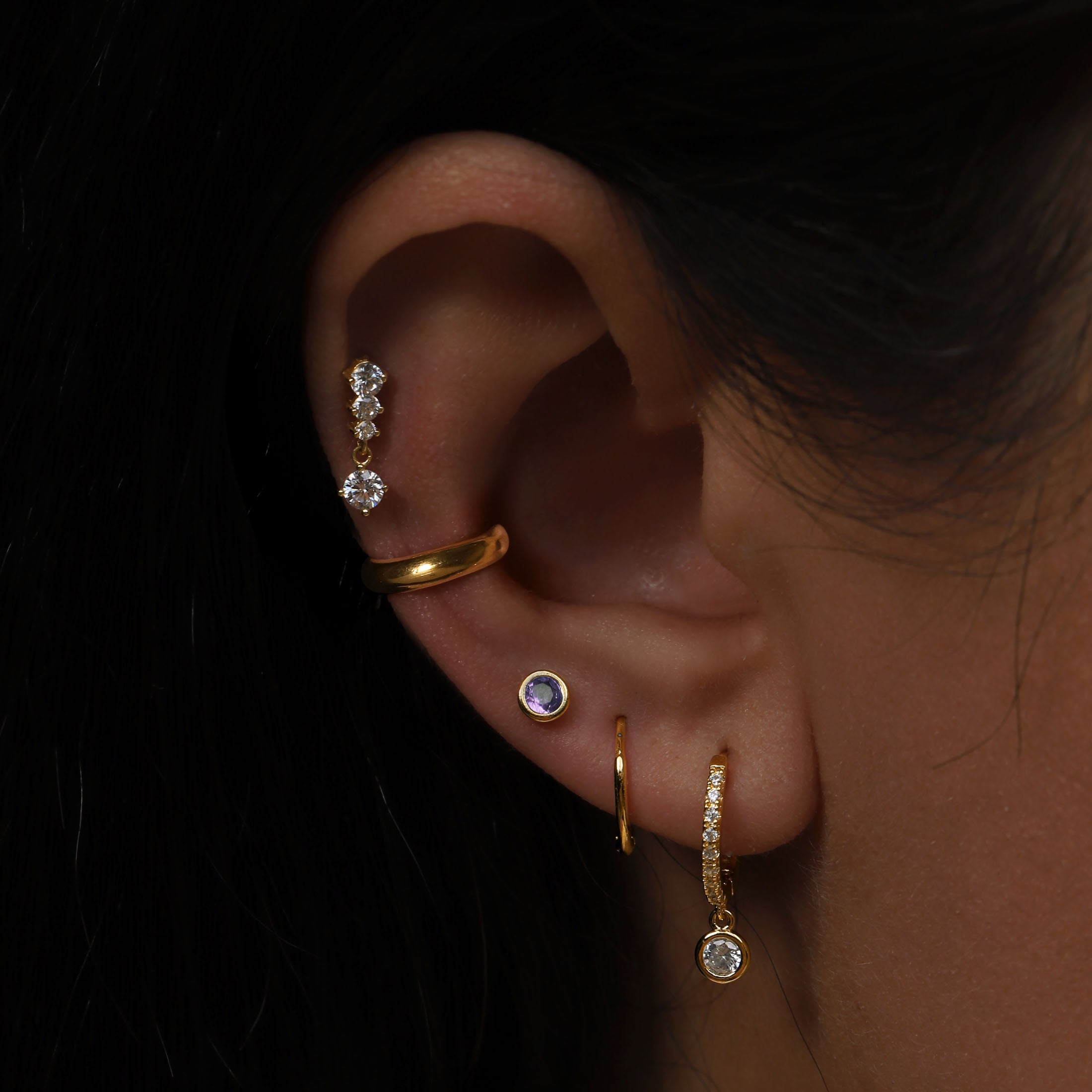 February Birthstone Tragus Helix Cartilage & Conch Ear Piercing On Model - Gold