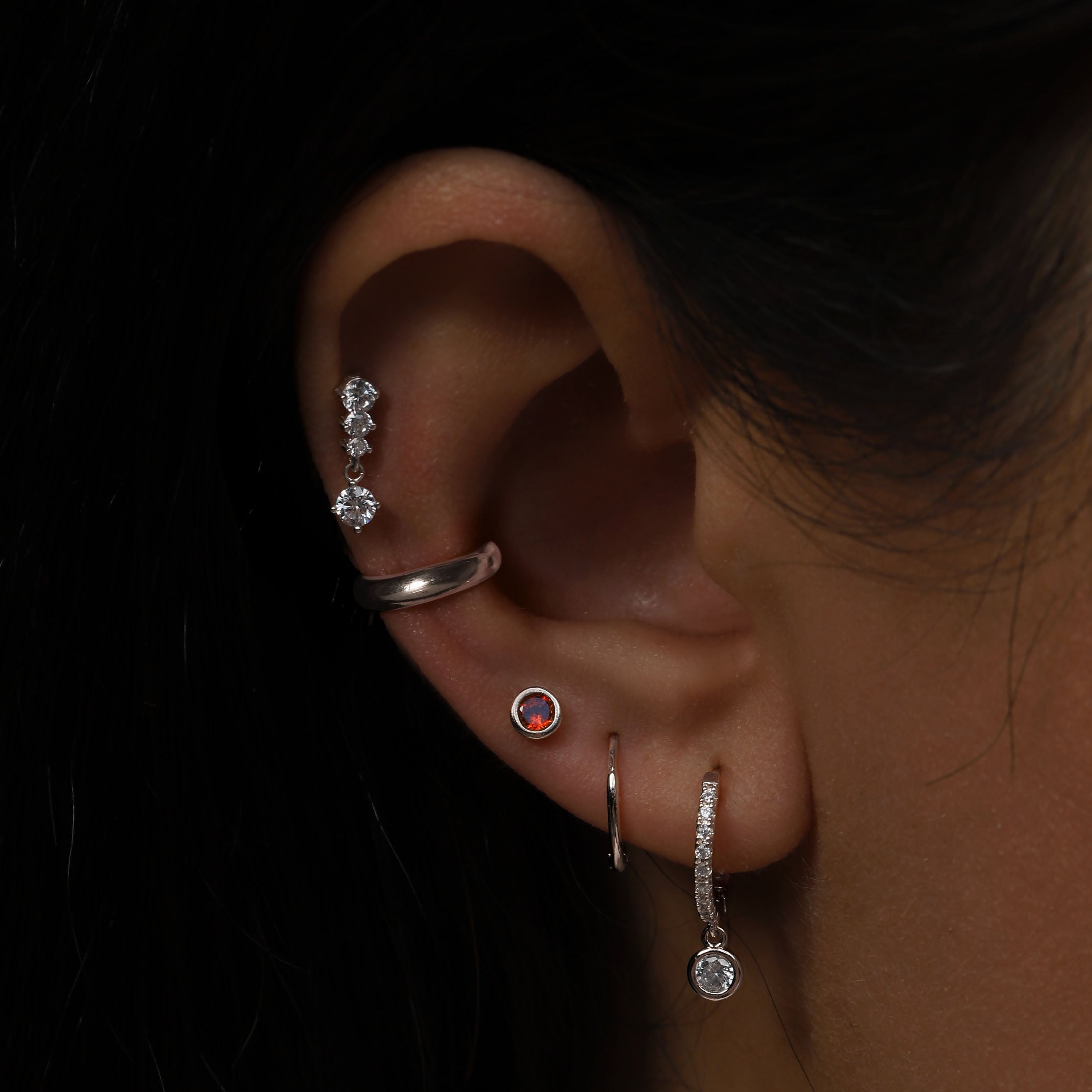 January Birthstone Tragus Helix & Conch Ear Piercing On Model - Sterling Silver