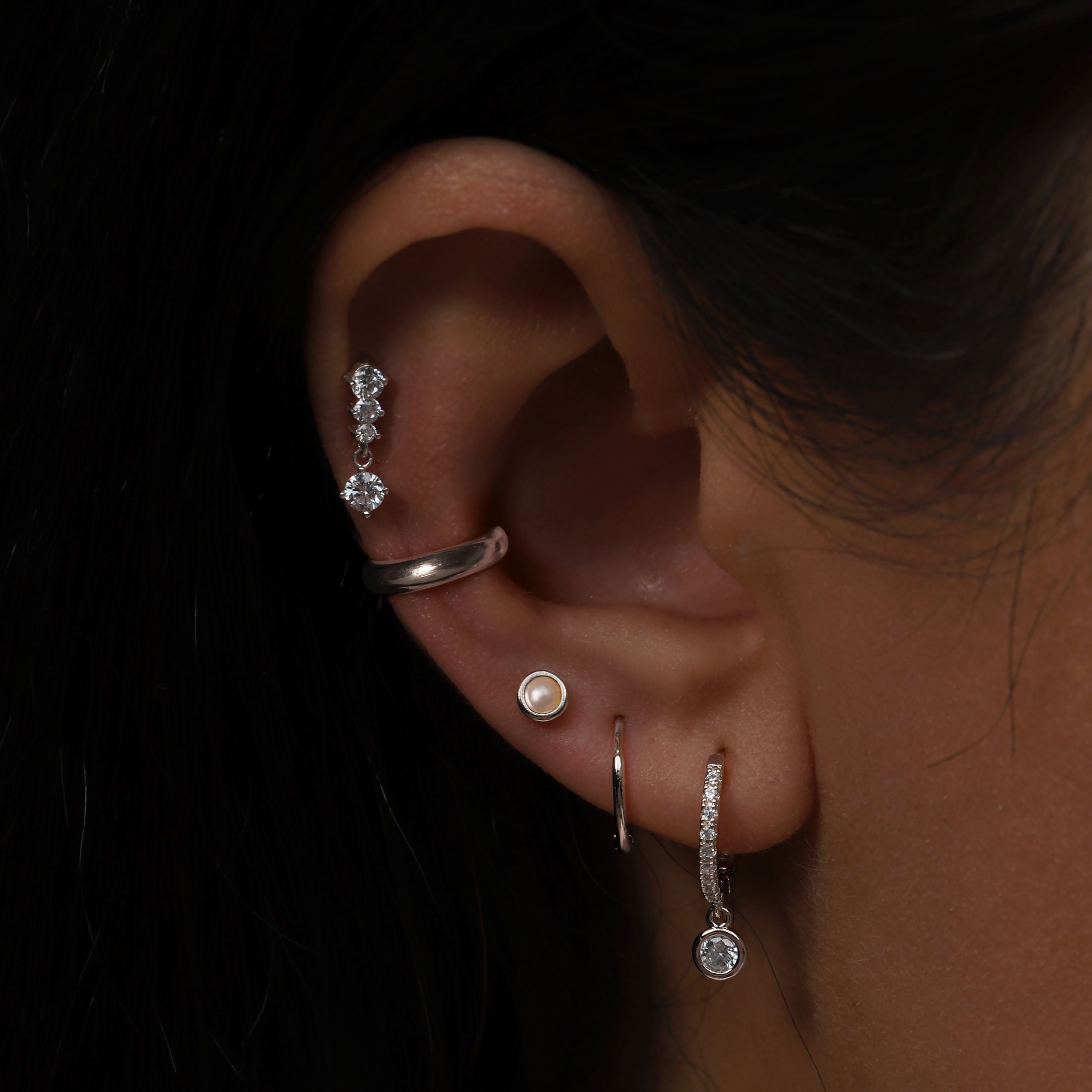 June Birthstone Tragus Helix & Conch Ear Piercing On Model - Sterling Silver