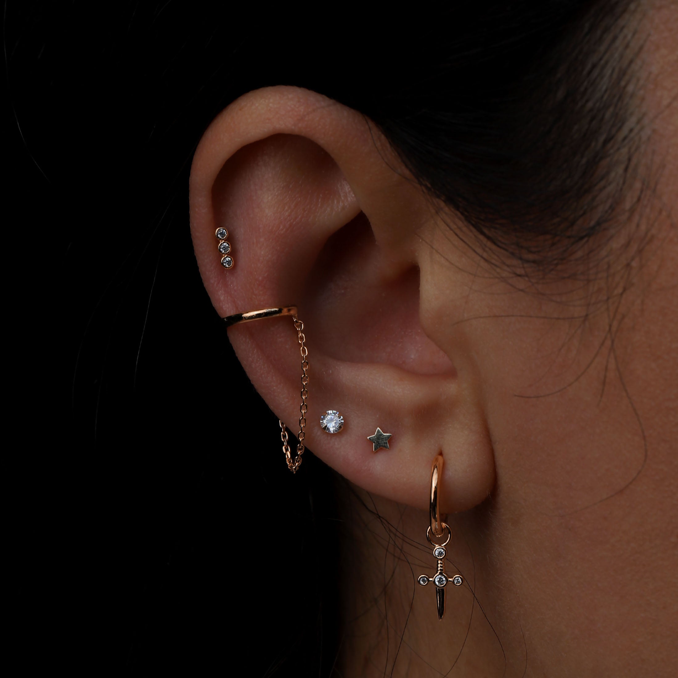 Donna Triple Gemstone Helix Tragus & Cartilage Ear Piercing On Model - Rose Gold