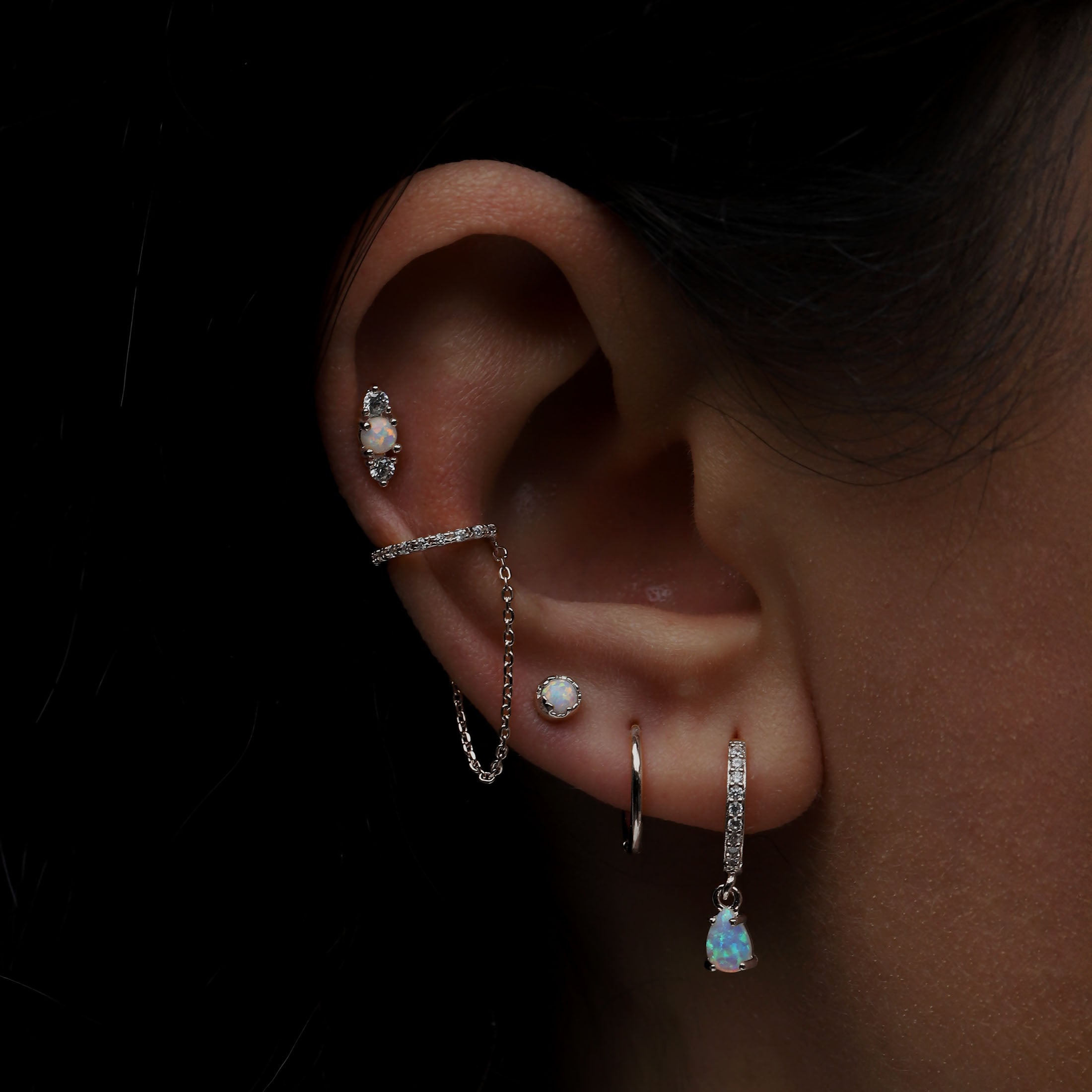 Glory Opal Helix Tragus Cartilage & Conch Ear Piercing On Model - Silver