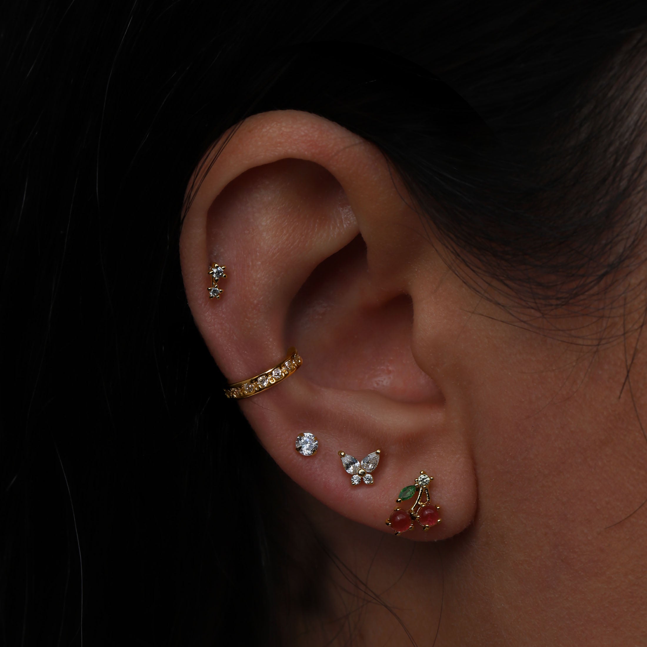 Twin Stars Gemstone Helix Tragus Cartilage & Conch Ear Piercing On Model - Gold
