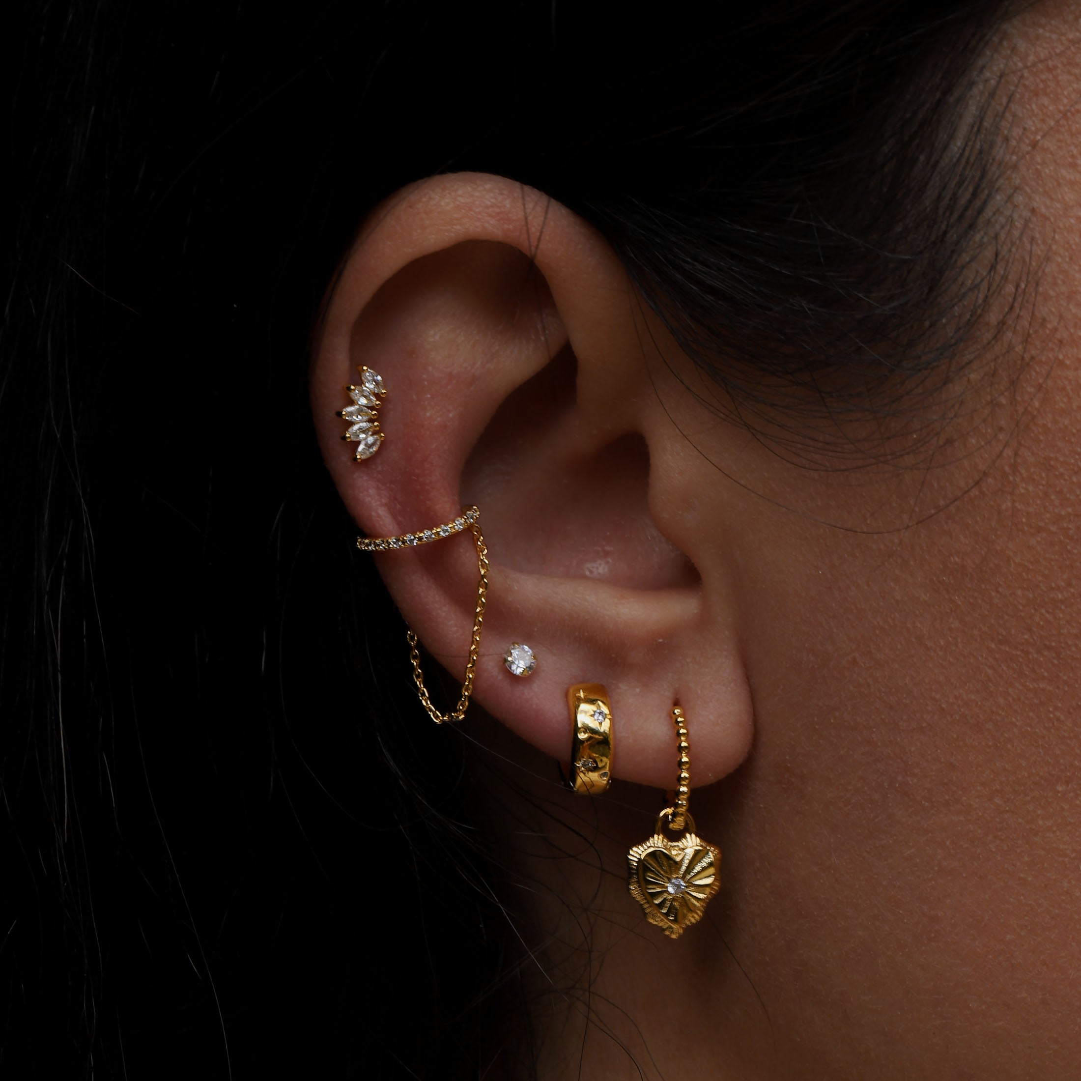 Astral Star Huggie Hoop Earrings On Model - Gold