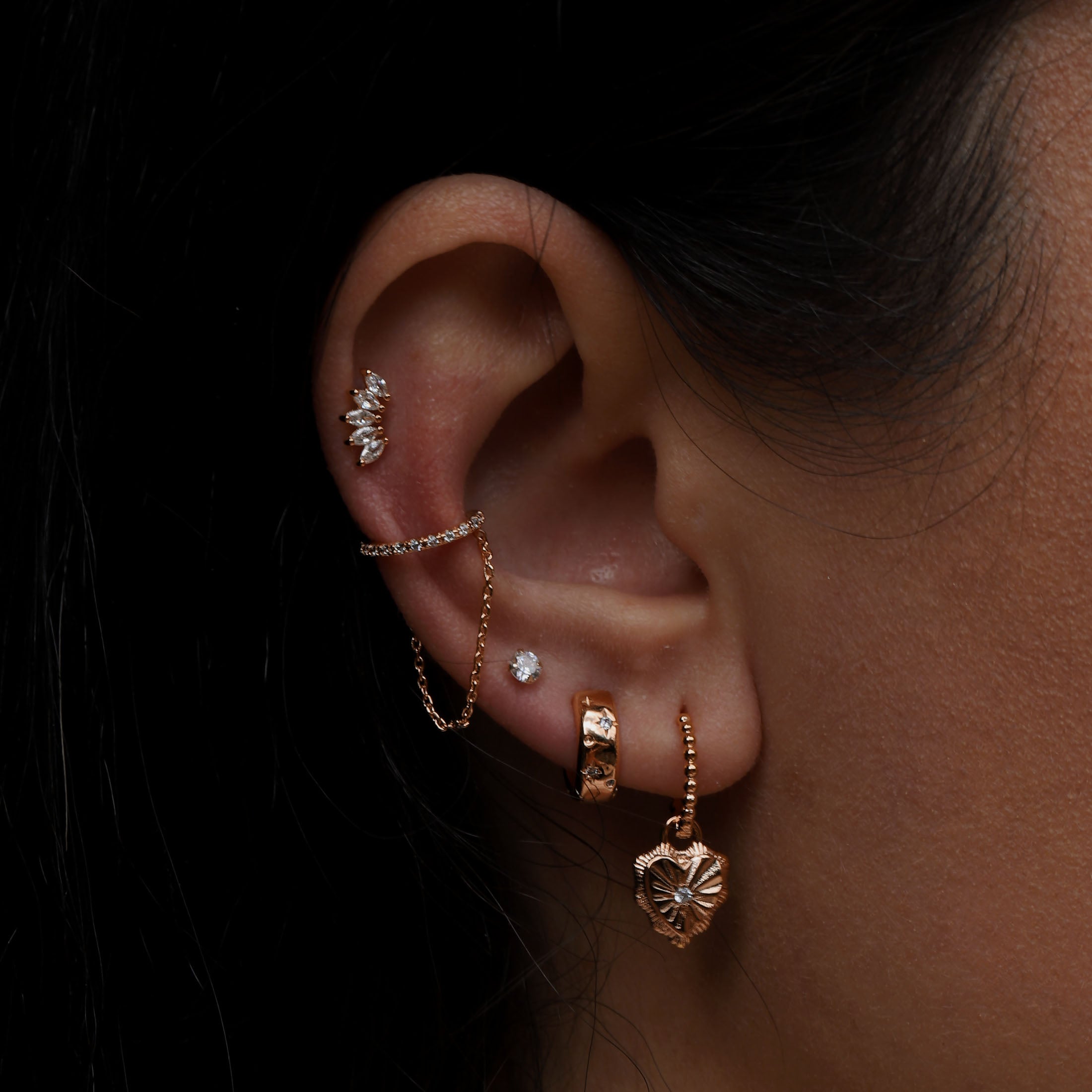 Astral Star Huggie Hoop Earrings On Model - Gold