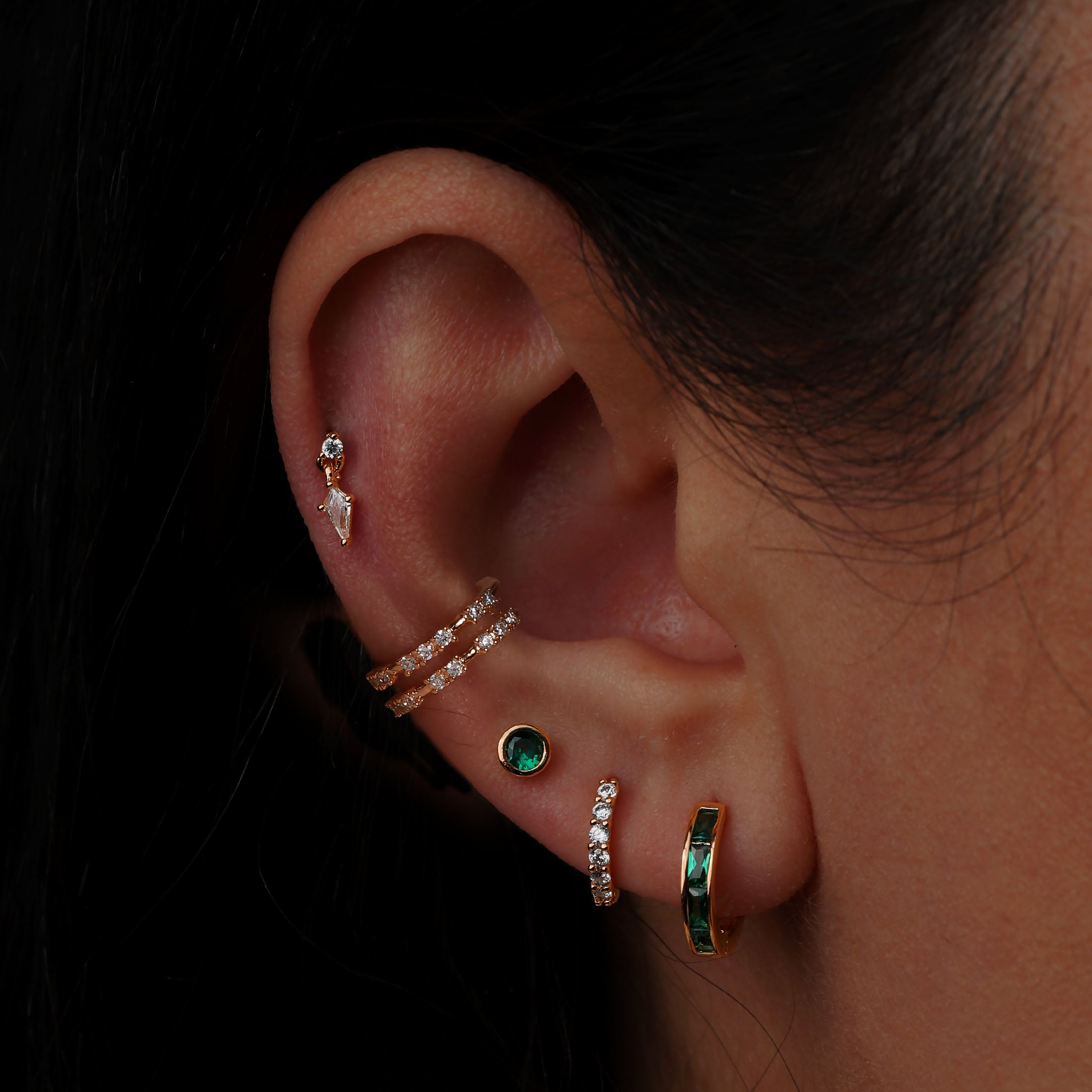 Eternity Emerald Gemstone Huggie Earring Hoops On Model - Rose Gold