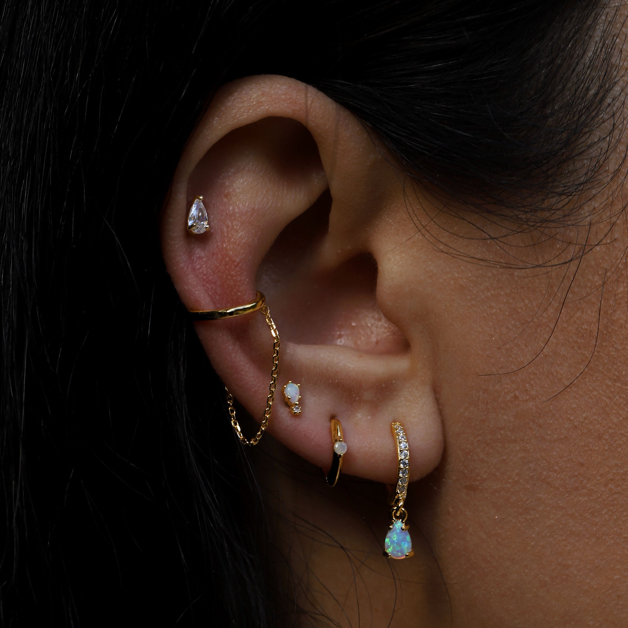 Orion Moonstone Huggie Hoop Earrings On Model - Gold
