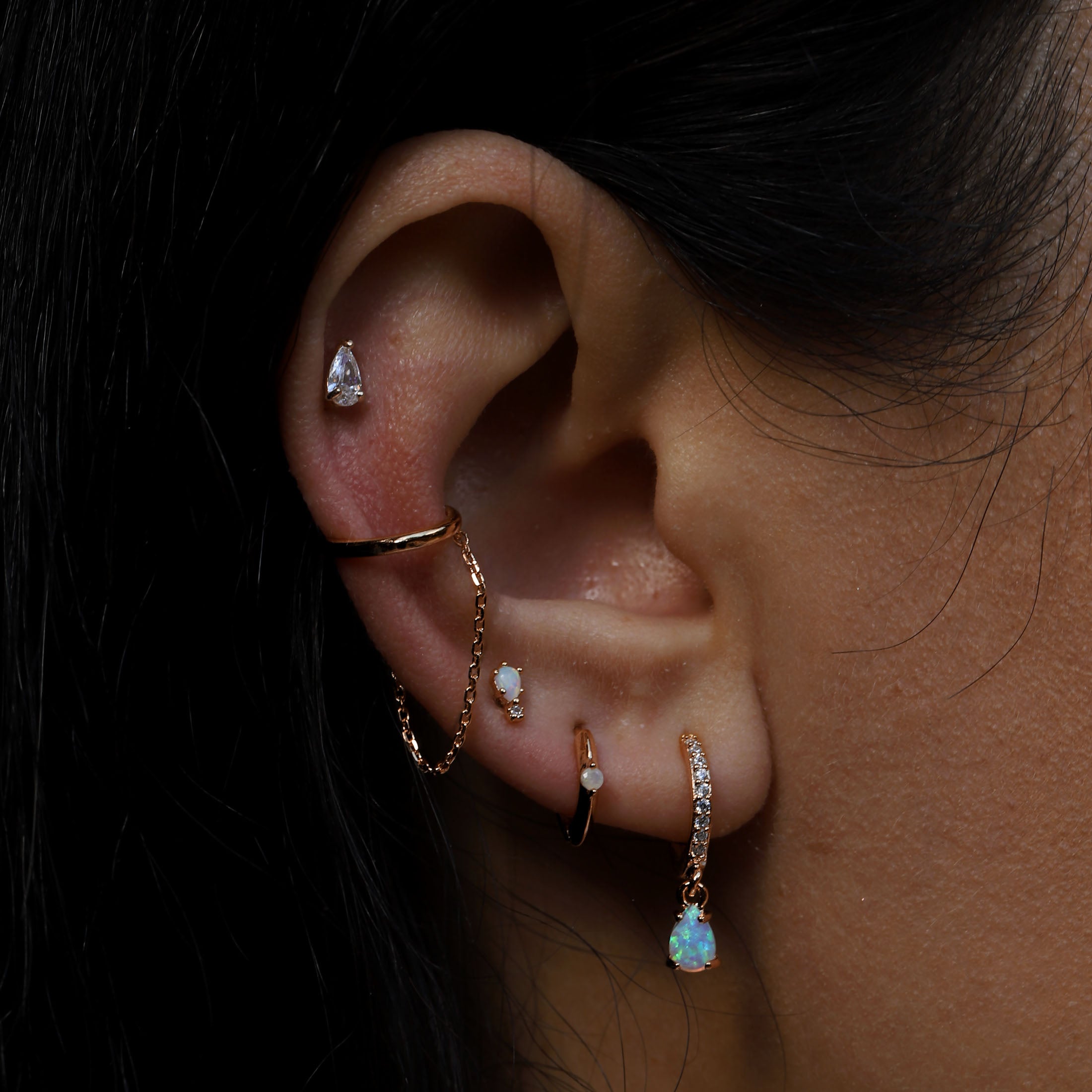 Orion Moonstone Huggie Hoop Earrings On Model - Rose Gold