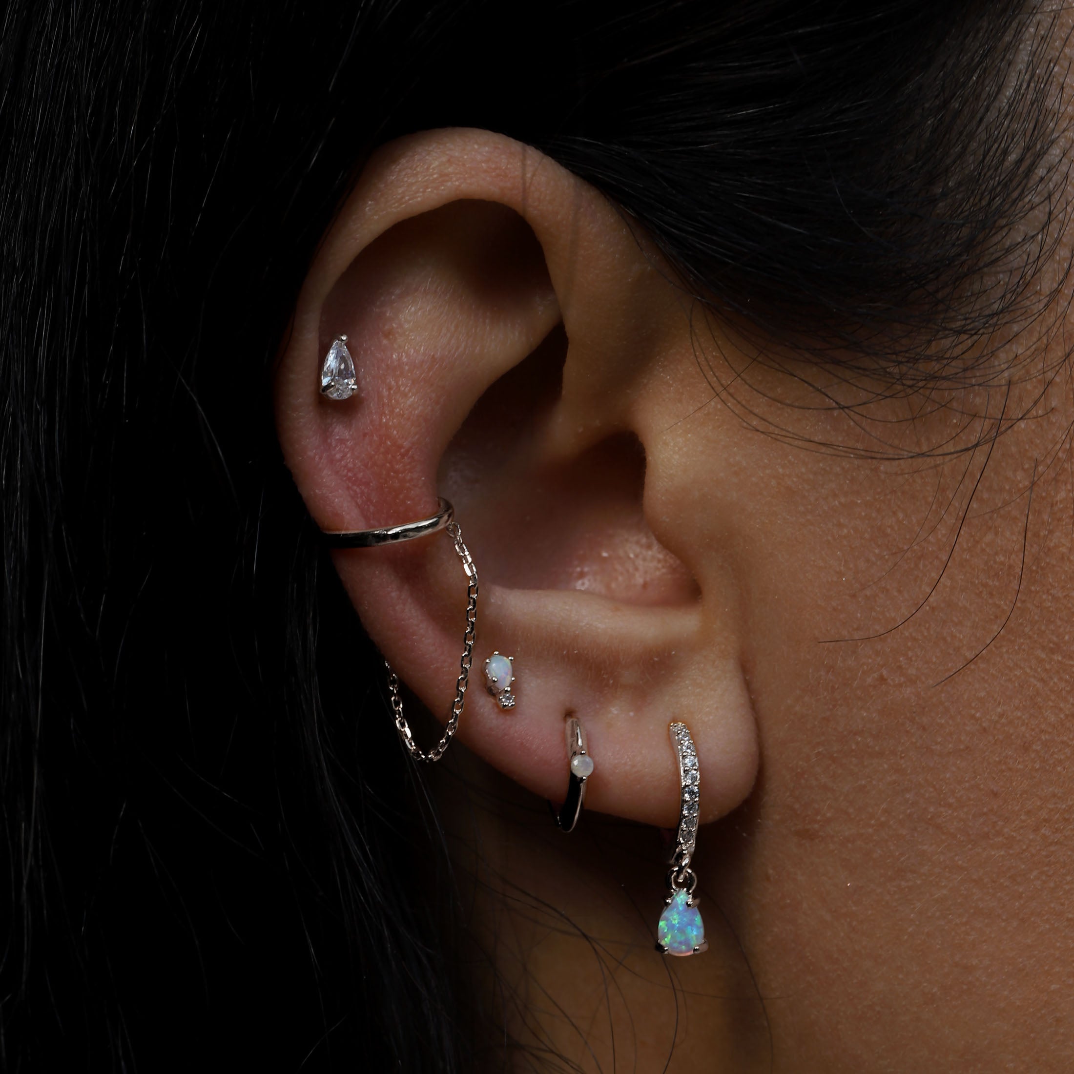 Orion Moonstone Huggie Hoop Earrings On Model - Sterling Silver