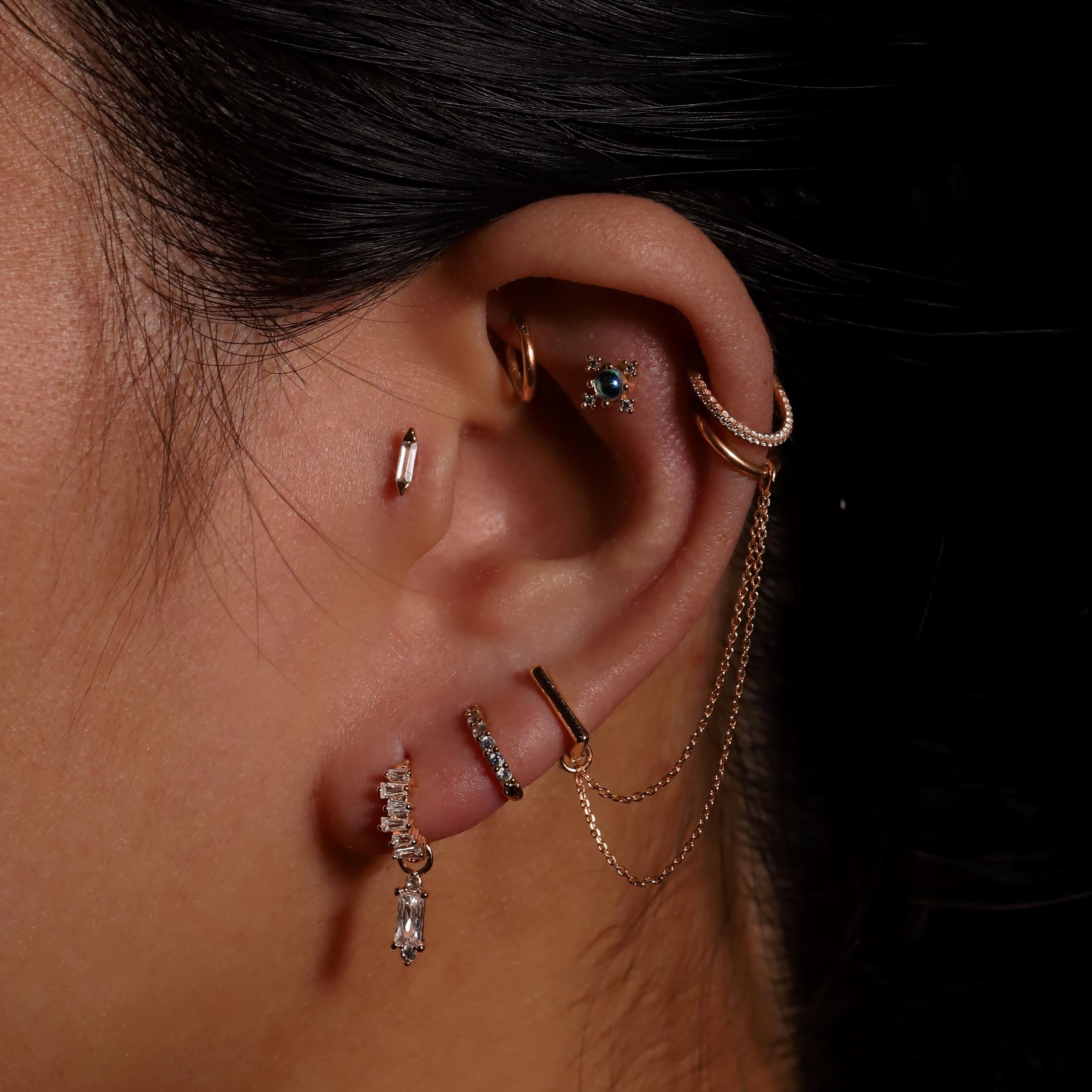 Valis Bar Earring Huggie Hoops On Model - Rose Gold