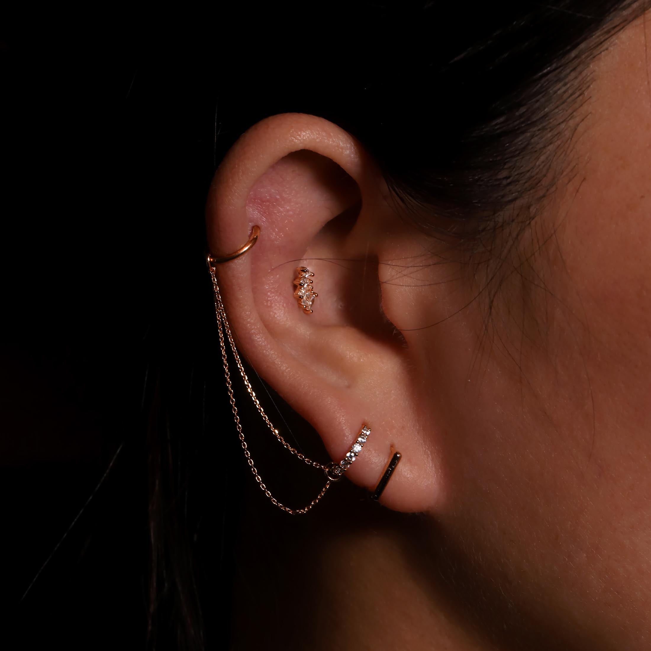 Valis Bar Earring Huggie Hoops On Model 2 - Rose Gold