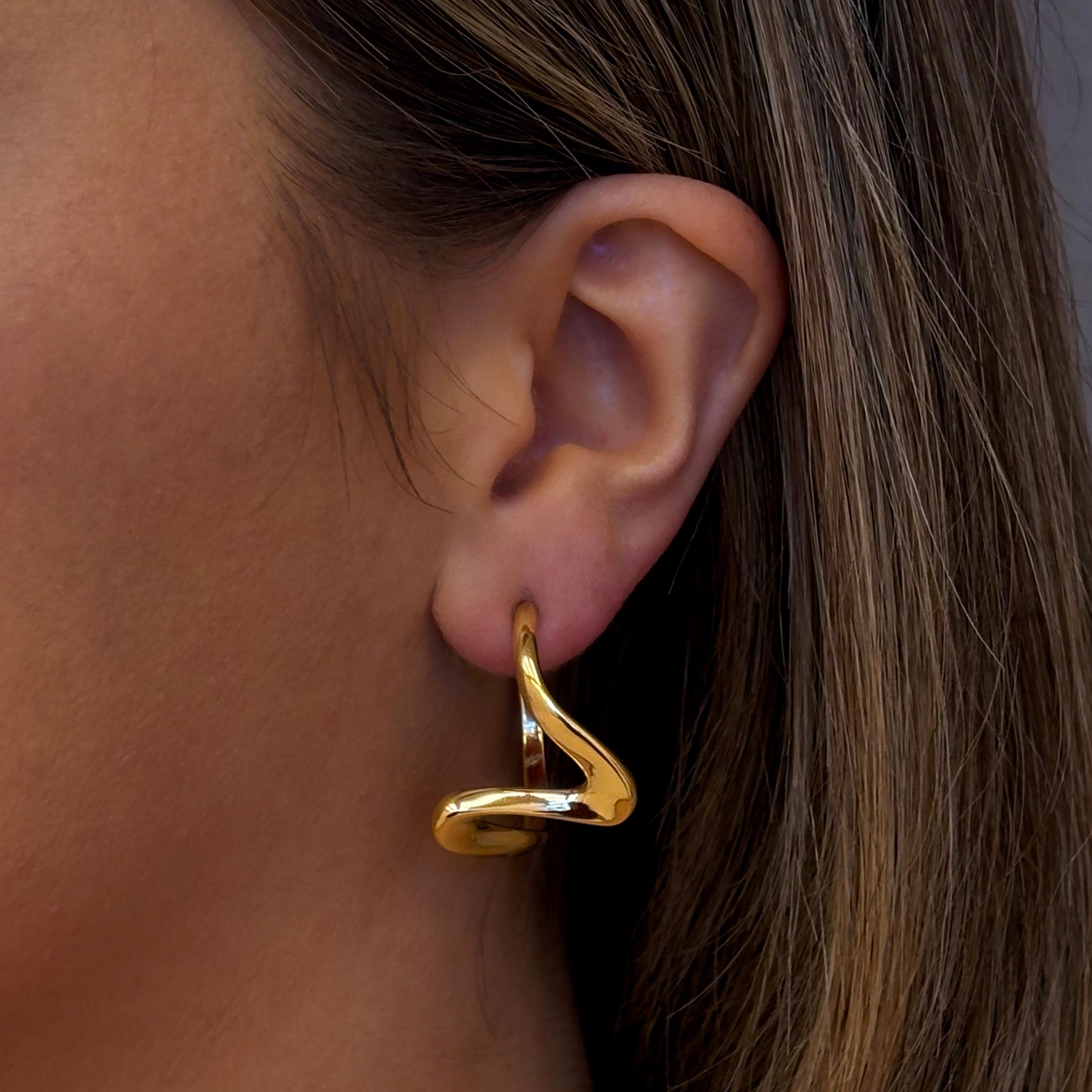 Wavelength Statement Earrings On Model - Gold