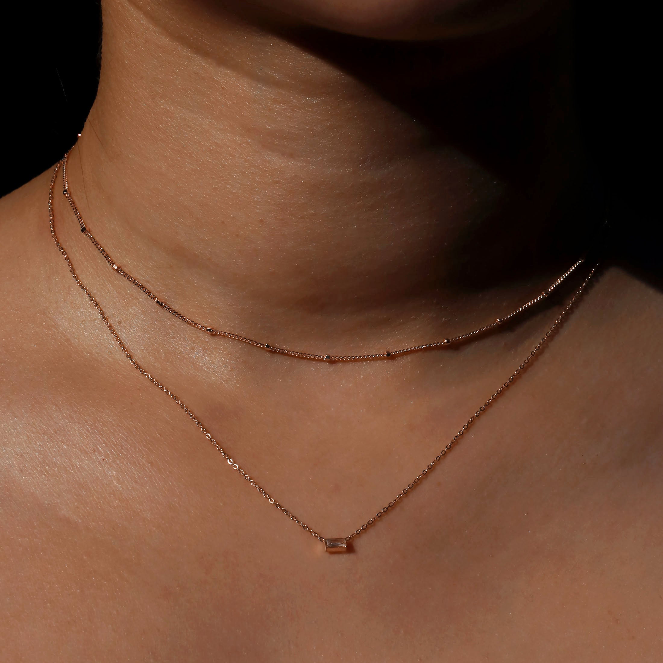 Array Fine Beaded Chain Necklace On Model 2 - Rose Gold
