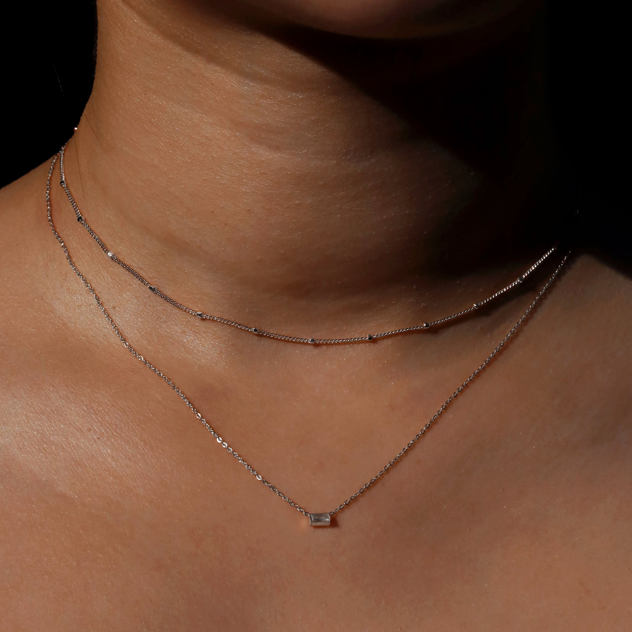 Array Fine Beaded Chain Necklace On Model 2 - Silver